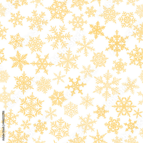 Christmas seamless pattern with complex big and small snowflakes, yellow on white background