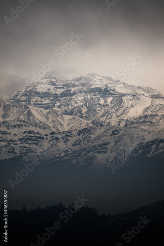A big mountain with trees in a cloudy day at Santiago