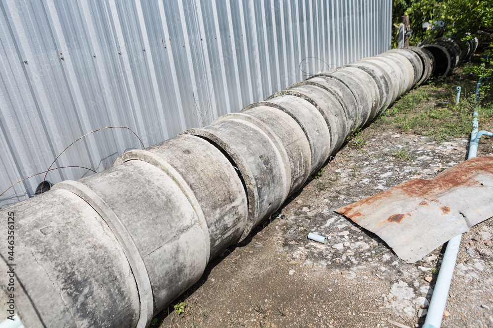 Asbestos pipe pile on the ground in the construction area Asbestos pipe pile on the ground in the construction area
