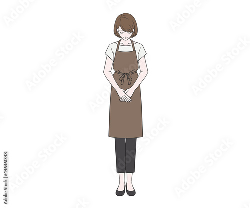 お辞儀をするカフェ店員