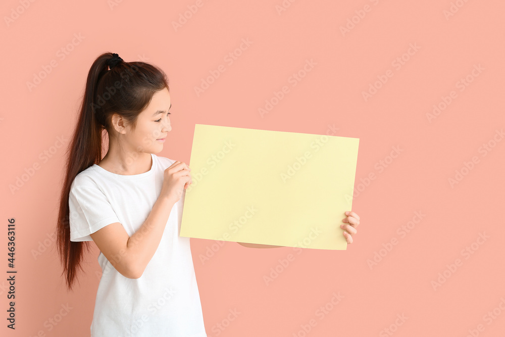 Little girl with blank paper sheet on color background Little girl with blank paper sheet on color background