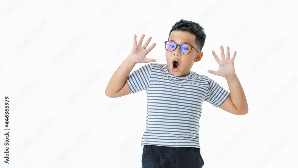 Funny cutout portrait of healthy Asian boy wearing glasses and casual horizontal striped shirt shout out loud with hands covering face as shocked, surprising, exciting on unexpected opportunity Funny cutout portrait of healthy Asian boy wearing glasses and casual horizontal striped shirt shout out loud with hands covering face as shocked, surprising, exciting on unexpected opportunity