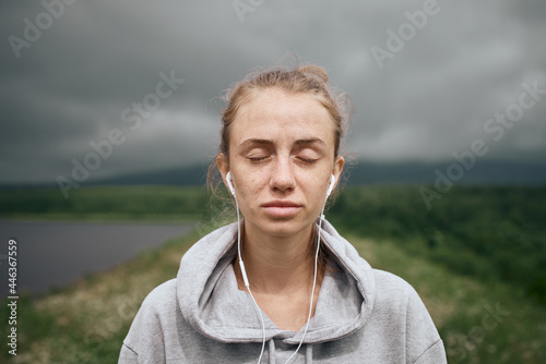 Portrait of beautiful woman with eyes closed