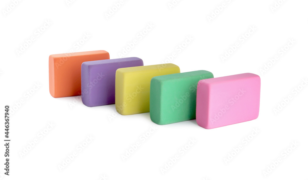 Row of bright erasers on white background Row of bright erasers on white background