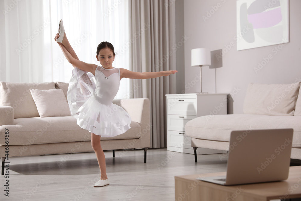 Cute little girl taking online dance class at home Cute little girl taking online dance class at home