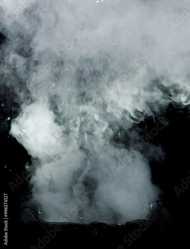 concept photo of scary eruption event of volcano smoke explosion, huge column of smoke in the sky isolated on black background. poster element.