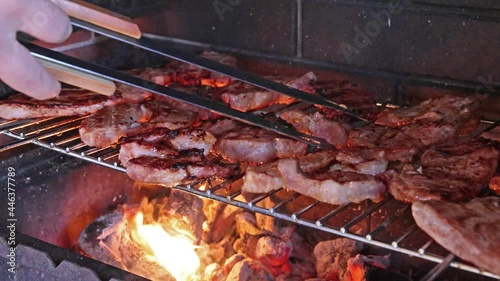 video with meat on fire preparation