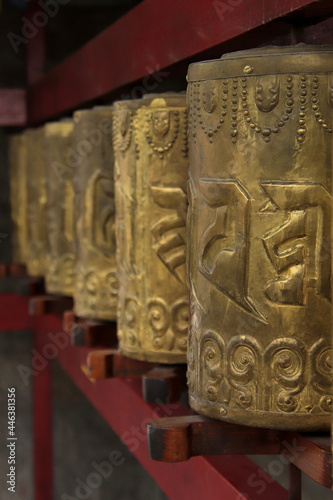Tibetan Buddhist prayer wheels at a Buddhist temple in Dharamsala, India