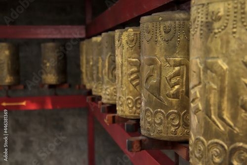 Tibetan Buddhist prayer wheels at a Buddhist temple in Dharamsala, India