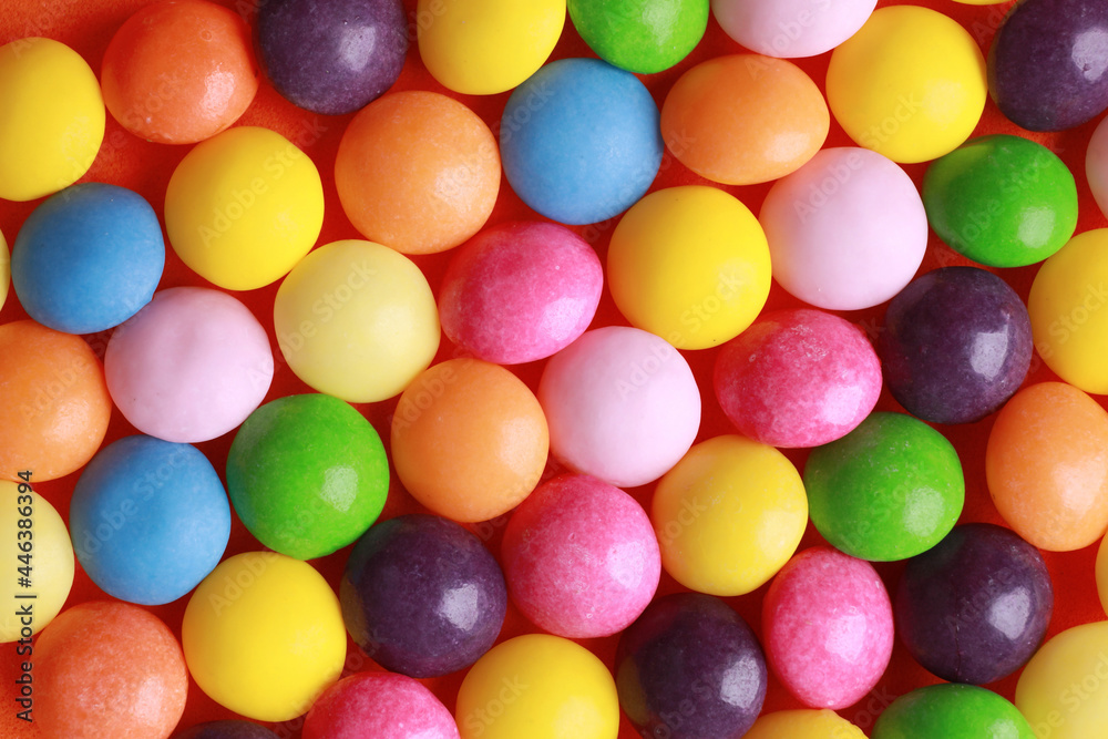 Obraz premium Many delicious colorful dragee candies, above view