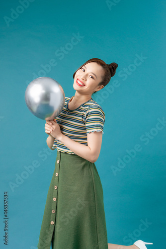 Beautiful woman with balloons