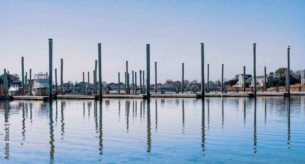 Abstract geometry of pier poles at the marina in Hyannis Harbor on Cape Cod, Massachusetts