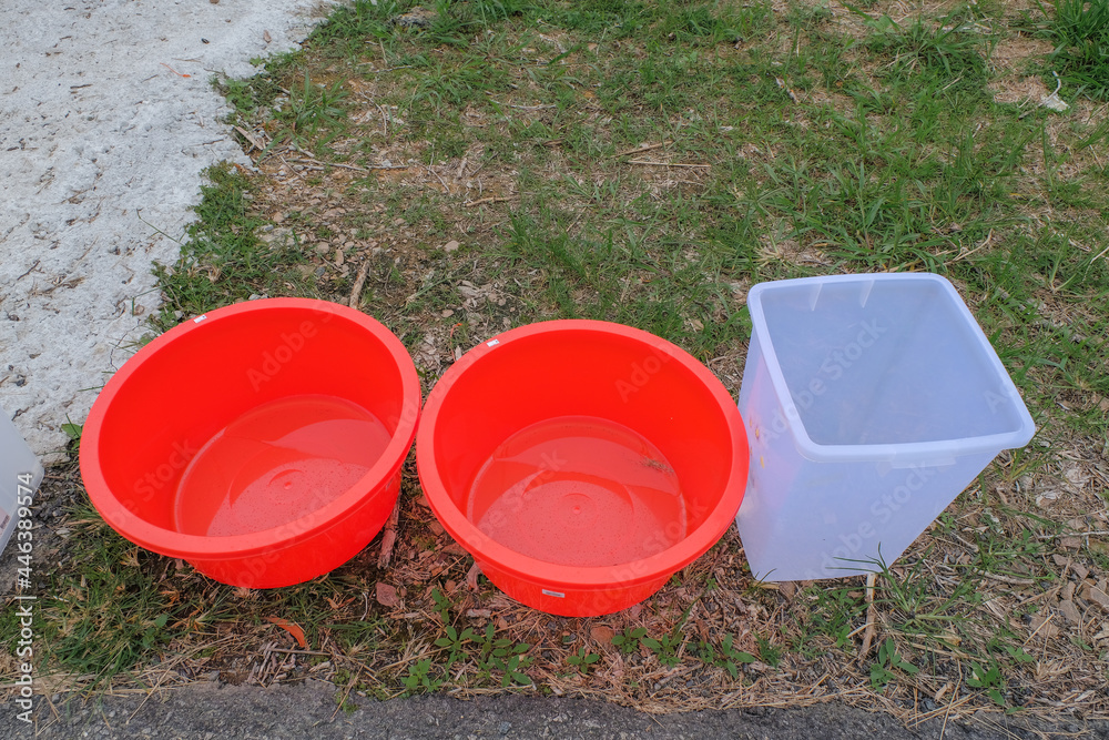 Water storage in a large plastic container because of a water supply disruption. River pollution issue. Water storage in a large plastic container because of a water supply disruption. River pollution issue.