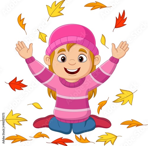 Cartoon little girl throwing autumn leaves