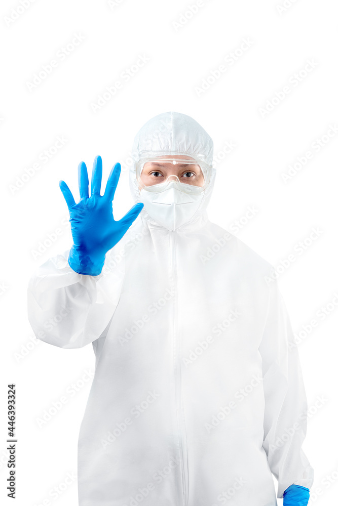 Health worker woman with a protective suit and gloves standing Health worker woman with a protective suit and gloves standing