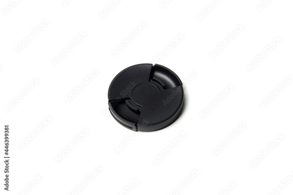 Black camera lens cover, isolated on a white background Black camera lens cover, isolated on a white background