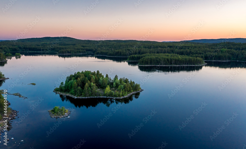 Fototapeta premium Evening panorama on Karelian lake Kovdozero. Settlement Zelenoborsky, Kandalaksha, Murmansk region, Kola Peninsula. Polar day. Karelian landscape
