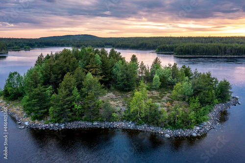 Evening panorama on Karelian lake Kovdozero. Settlement Zelenoborsky, Kandalaksha, Murmansk region, Kola Peninsula. Polar day. Karelian landscape photo