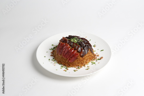 steamed sticky glutinous fried rice with mixed waxed meats chinese sausage wrapped in lotus leaf on gold asian menu