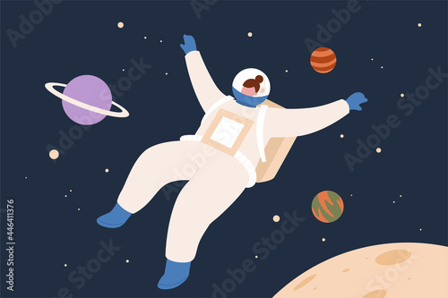 Female astronaut floating in space