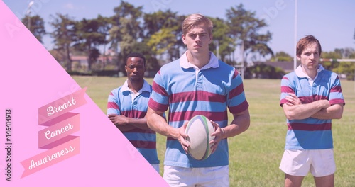 Composition of pink ribbon logo and breast cancer text, with rugby players