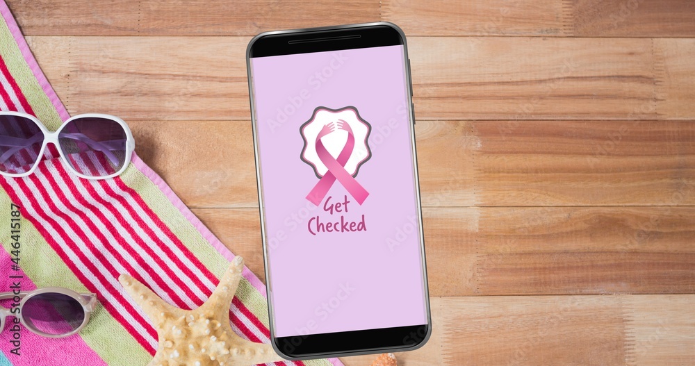Composition of pink ribbon logo and breast cancer text on the smartphone screen Composition of pink ribbon logo and breast cancer text on the smartphone screen
