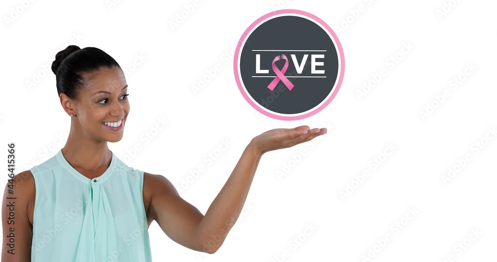 Composition of pink ribbon logo and love text, with smiling young woman Composition of pink ribbon logo and love text, with smiling young woman