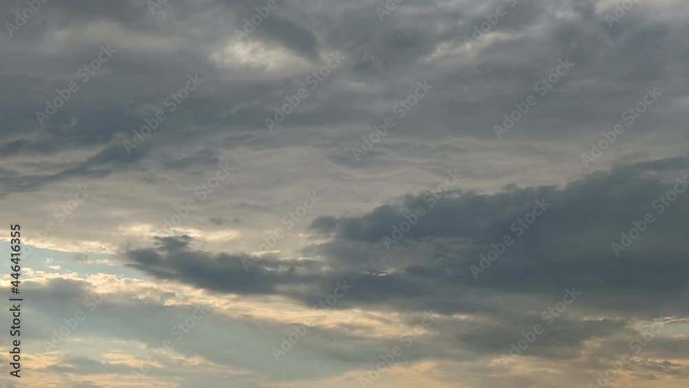 Clouds at different levels quickly fly by. Multilevel clouds, cumulus and persitus, quickly sweep from left to right across the sky with varying speed and size. Clouds at different levels quickly fly by. Multilevel clouds, cumulus and persitus, quickly sweep from left to right across the sky with varying speed and size.
