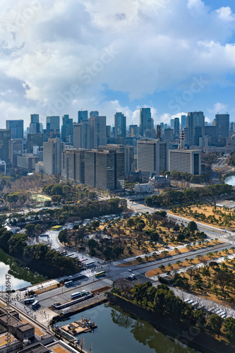 Bird's-eye view of the national park of Kokyo Gaien National Garden in Tokyo Imperial Palace with the Hibiya Park and the skyscrapers of Kasumigaseki in background.