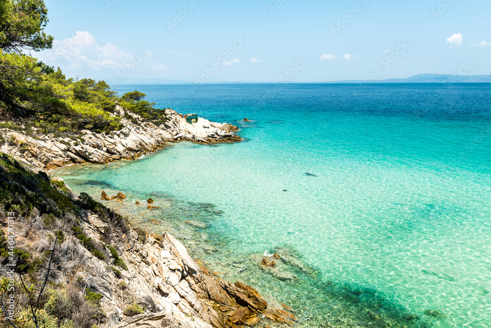 Fototapeta premium Aegean sea coast landscape with aquamarine water, view near Mega Portokali Beach (Sithonia, Chalkidiki, Greece)