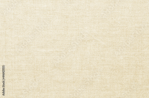 Linen fabric texture background. Natural beige cloth canvas surface closeup 