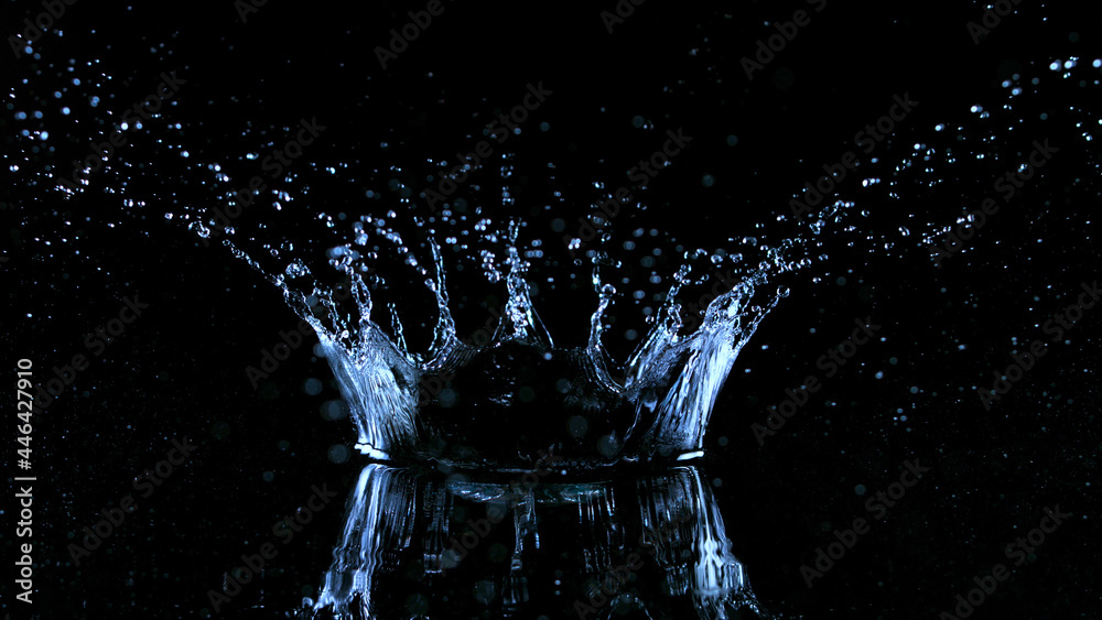 Freeze motion of water splash on black background. Freeze motion of water splash on black background.