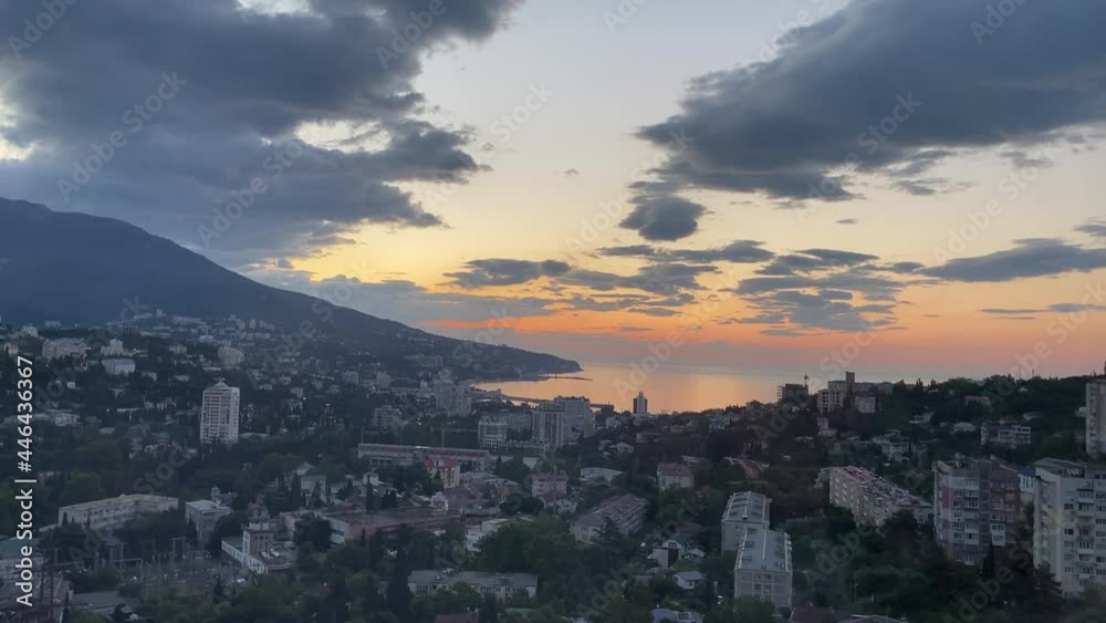 Urban landscape with a view of the sunrise. Yalta, Crimea Urban landscape with a view of the sunrise. Yalta, Crimea