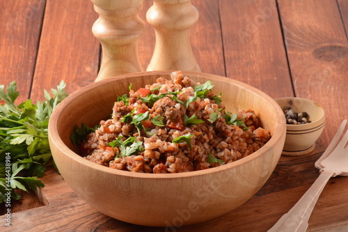 Buckwheat porridge with beef meat and vegetables. Russian cuisine photo