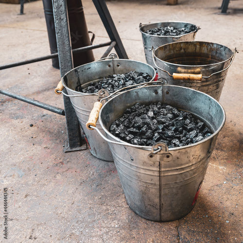 Three coal buckets on the floor © Jon Probert