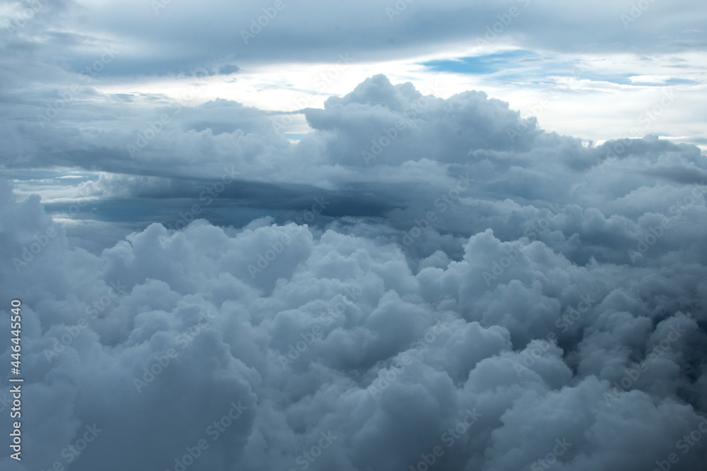 Cloudscape and sky Aerial view from Airplane Window.