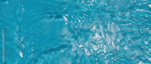 Fototapeta Naklejka Na Ścianę i Meble -  Water waves in sunlight Abstract surface blue