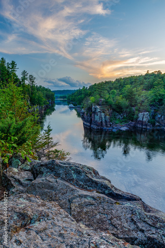 St. Croix River during sunset with colorful sky at Interstate State Park in St. Croix Falls Wisconsin. 