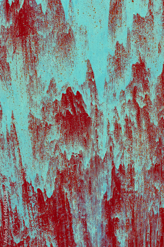 Rusty green painted metal background.
