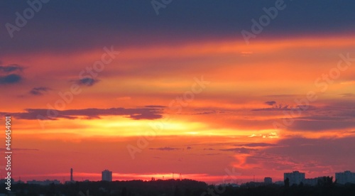 Beautiful red fiery sunset over the city  natural background 