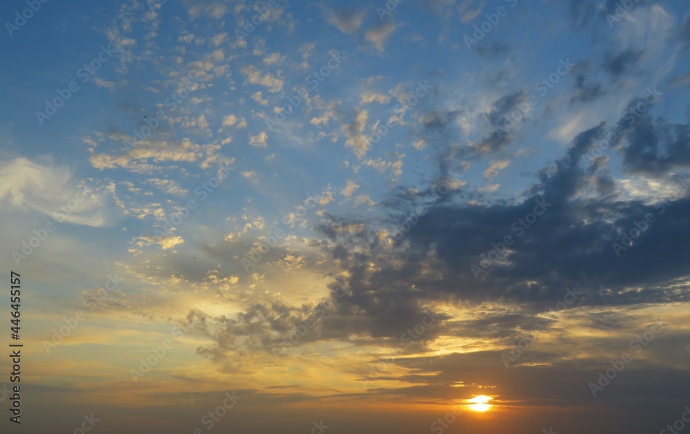 Beautiful colorful sunset in blue sky, natural background 