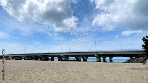 Wallpaper Mural NAHA, OKINAWA, JAPAN - JUNE 2021 : View of Naminoue beach (Ocean or sea). Clear blue summer sky and clouds. Wide view time lapse shot in daytime. Holiday, vacation and resort concept shot. Torontodigital.ca