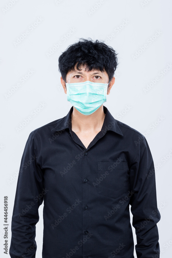 Asian men wear masks to prevent PM.5 dust and The coronavirus epidemic is spreading isolated white background. Asian men wear masks to prevent PM.5 dust and The coronavirus epidemic is spreading isolated white background.