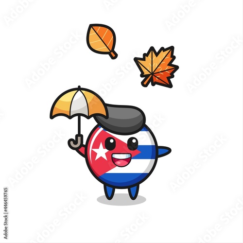 cartoon of the cute cuba flag badge holding an umbrella in autumn