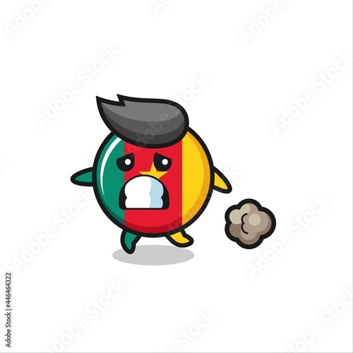 illustration of the cameroon flag badge running in fear © heriyusuf