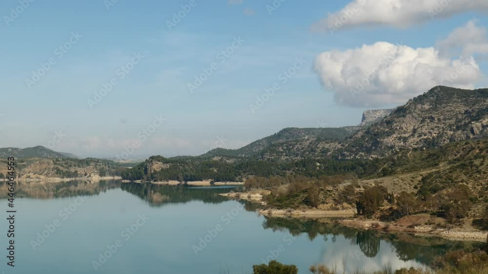 Spanish nature landscape. Lake Embalse del Guadalhorce and surrounding countryside, Ardales Reservoir, Malaga Andalusia, Spain. Zoom out Spanish nature landscape. Lake Embalse del Guadalhorce and surrounding countryside, Ardales Reservoir, Malaga Andalusia, Spain. Zoom out