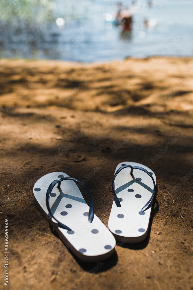 Φωτογραφία Rubber slippers for swimming and walking on the sand near the lake - swimming in