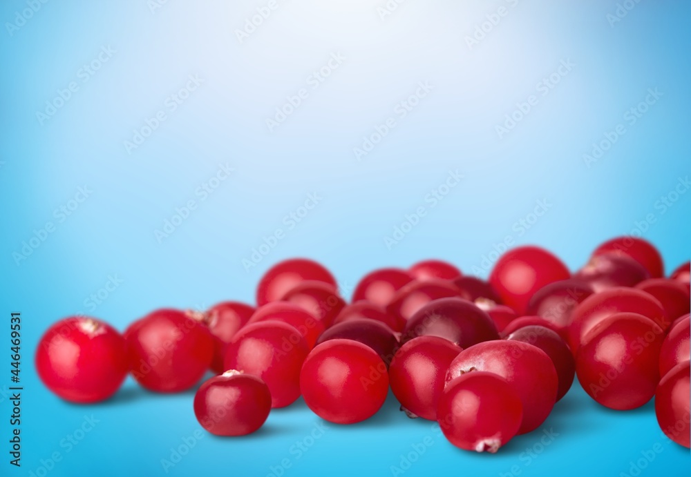 Tasty juicy ripe red cranberries on a desk