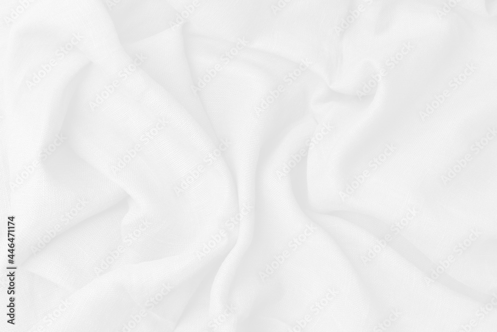 Cotton textile is wave beautiful  for wallpaper. Top view white fabric luxurious softness smooth on white background with copy space. Design textured, abstract, background.