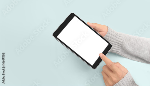 Hands holding tablet touch computer gadget